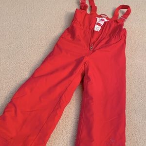 Girls Obermeyer I-Grow adjustable snow pants.